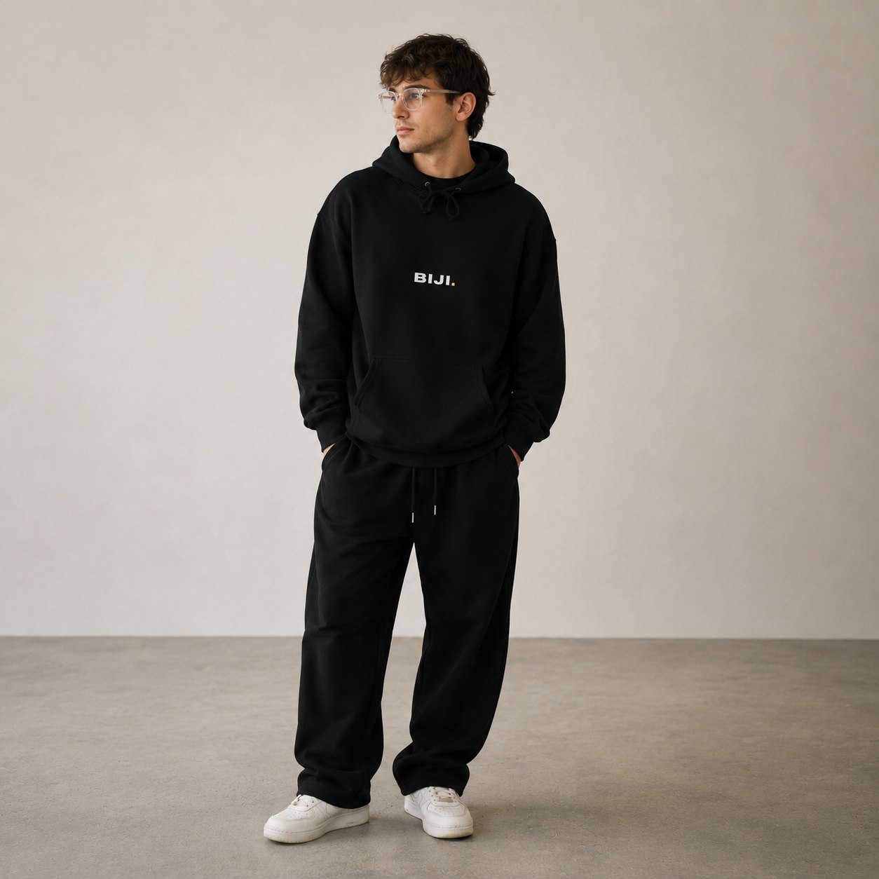 BIJI Hoodie in Black, front view on model